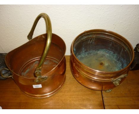 Copper and brass helmet shaped coal scuttle together with a circular copper log bin