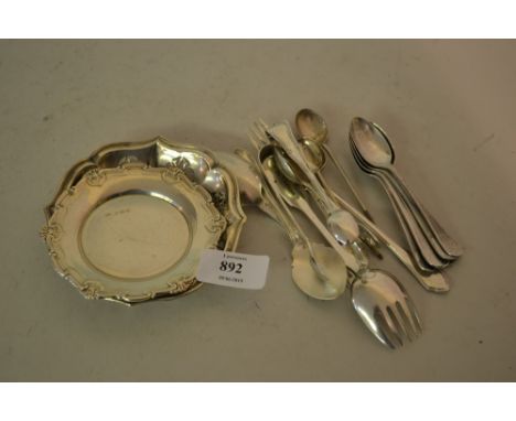 Two small circular silver dishes together with a small quantity of silver flatware