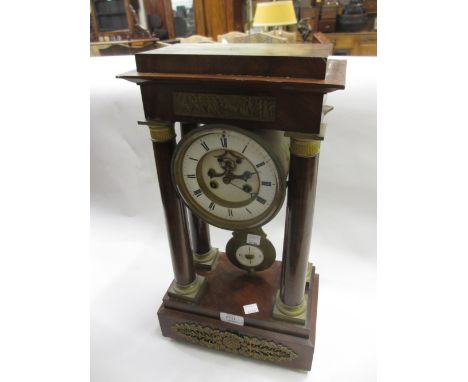 19th Century mahogany portico clock having circular enamel dial with Roman numerals and visible escapement with two train mov