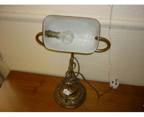 Embossed brass desk lamp with an opaque glass shade