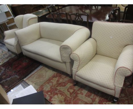 Late 19th or early 20th Century Chesterfield type two seat sofa on low square tapering supports together with two similarly u