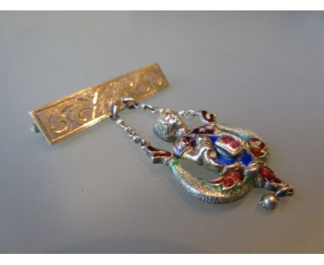 Silver enamel and pink ruby set brooch with figural drop