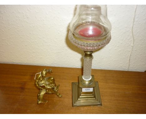 Gilt brass and cut glass mounted candle holder together with a gilt brass furniture mount in the form of a seated girl holdin