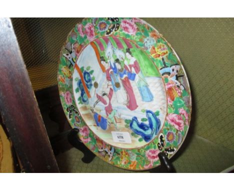 19th Century Canton enamel plate decorated with figures, flowers and butterflies (with restoration)