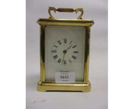 Large gilt brass cased carriage clock with enamel dial having Roman numerals by Mappin and Webb Limited