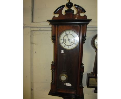 19th Century walnut cased Vienna style wall clock, the enamel dial with Roman numerals and two train spring driven movement