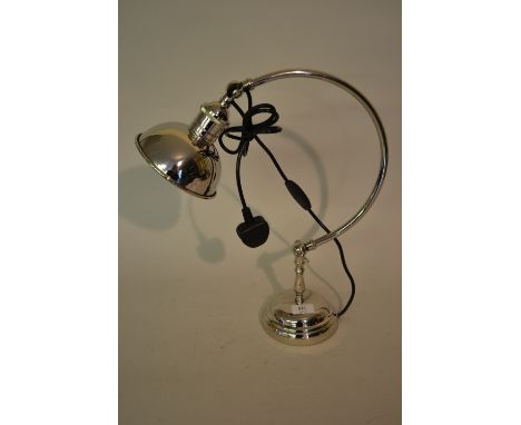 Nickel plated desk lamp on circular base