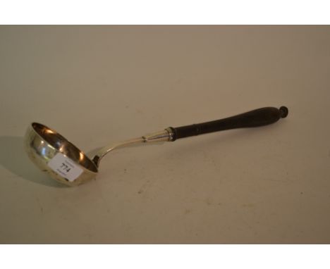 Antique white metal soup ladle with turned wooden handle (a/f)
