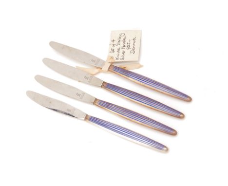 A SET OF FOUR DANISH SILVER AND ENAMEL KNIVES
The handles, marked 925, with striped blue enamel decoration, stainless steel b