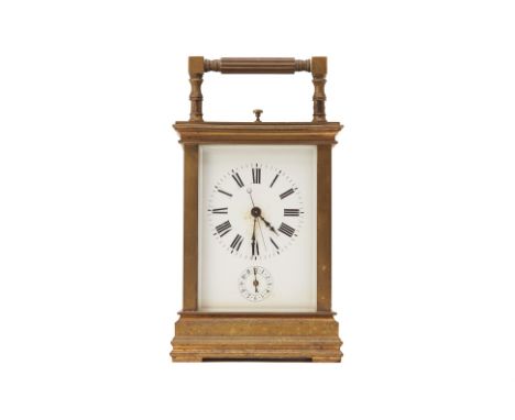 A FRENCH BRASS REPEATING CARRIAGE CLOCK
Late 19th Century
The white enamel dial with Roman numerals and subsidiary alarm dial