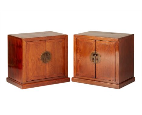 A PAIR OF WALNUT CABINETS
A pair of walnut cabinets made of 'hetao mu' (Chinese walnut), the cabinets with a rectangular top 