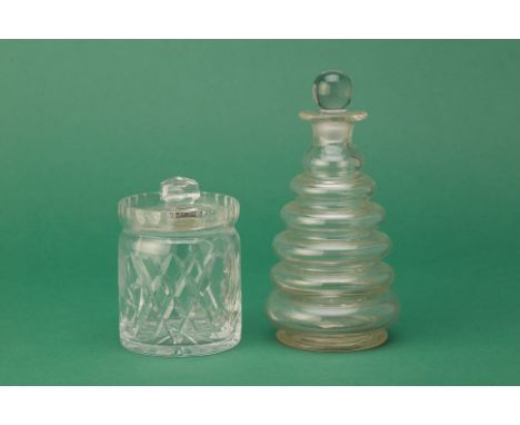 A LATE VICTORIAN  'BEEHIVE' DECANTER
with a hand cut lead crystal jar and cover made in West Germany, with decorative engrave