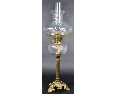 A 19th Century Victorian oil lamp table light having a pineapple shaped glass shade with central flume, twin Duplex burner wi