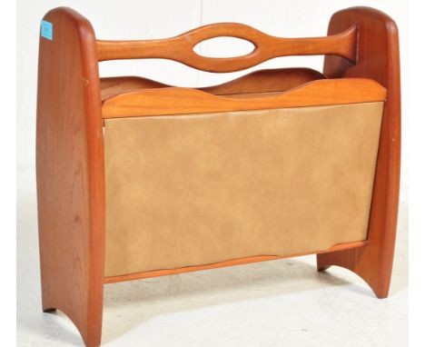 A collection of four retro vintage mid 20th century teak wood magazine racks of various styles. Largest measures 42cm x 48cm 