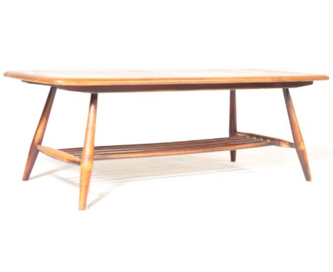 Ercol - Lucien Ercolani - Model 459. A retro vintage mid 20th century beech &amp; ash coffee table having a chamfered edge ra