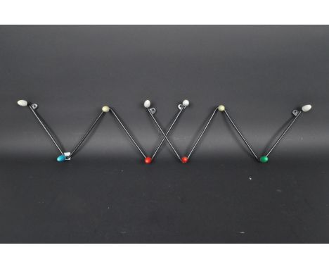 A pair of vintage retro mid 20th century Sputnik atomic style wire coat racks in a black colourway with multi colour bobbin h