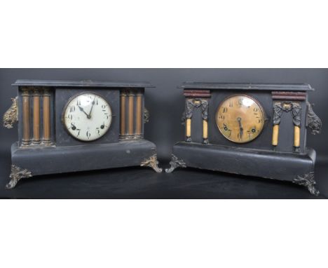 A pair of early 20th century WM. L. Gilbert American made Neo-classical style ebonised wood mantle clocks. Each being of arch