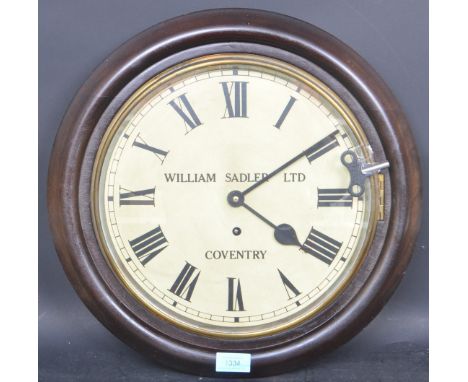 William Sadler Ltd - An early 20th century William Sadler circular wall clock. The clock having black roman numeral to the ch