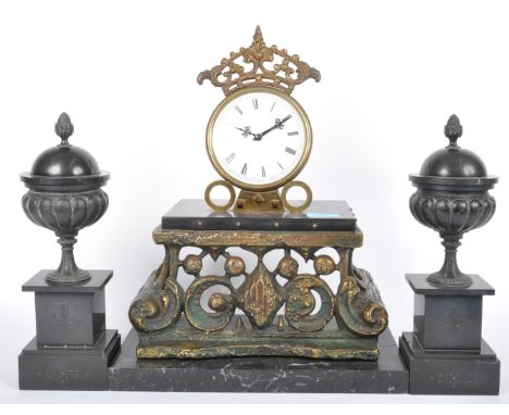 An early 20th century slate and gilt metal mantle clock having a white clock face with black roman numeral to the chapter rin