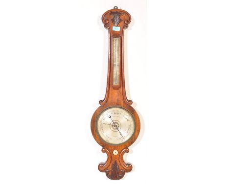 A 19th century Victorian mahogany &amp; mercury barometer having rosewood embellishments, floral decoration to the top, therm