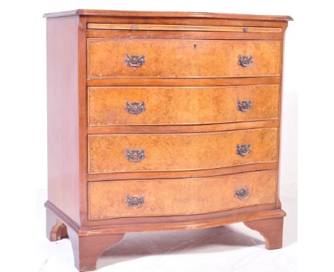 A 19th century Victorian era walnut inlaid bachelors chest of drawers having bowed front with a bank of four rectangular draw