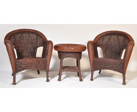 A pair of vintage retro 20th century conservatory garden wicker armchairs and table. The armchairs being of tub form and the 