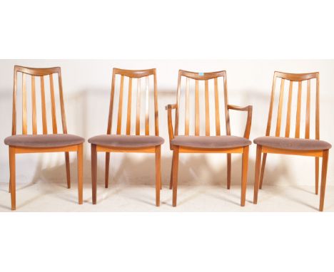 A set of five retro vintage mid 20th century G Plan teak wood dining chairs having rail backs, cushioned upholstered seats ra