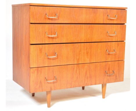 A retro vintage mid 20th century circa. 1960's teak chest of drawers. The chest of drawers having a bank of four rectangular 