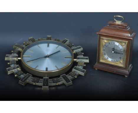 A vintage 20th Century Garrard &amp; Co / Elliot of London mantel clock having a mahogany case with brass and brushed metal c