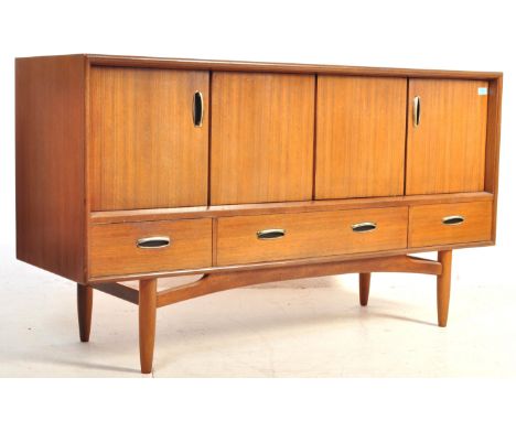 A retro vintage mid 20th century teak wood sideboard credenza having concertina style doors to the right and a single door ca