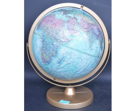 A retro vintage 20th century desktop globe having raised detailing to the continents set on a circular base. Measures