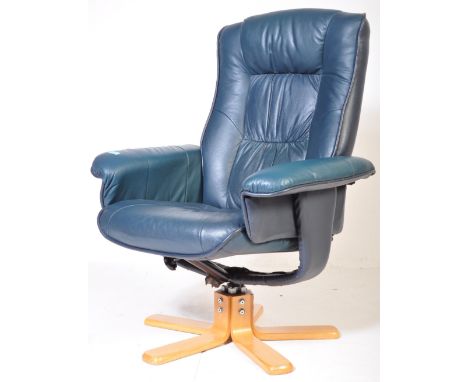A retro vintage 20th century Ekornes Stressless style reclining swivel office chair having cushioned armrests upholstered in 
