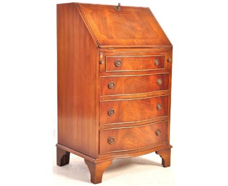 A Regency revival walnut serpentine fronted ladies bureau desk by Bevan Funnell Reprodux. Raised on bracket feet with a bank 