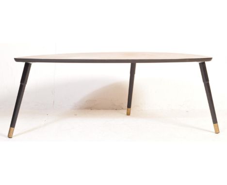 A retro vintage mid 20th century afromosia coffee occasional table. The table top being in the form of a leaf and being raise