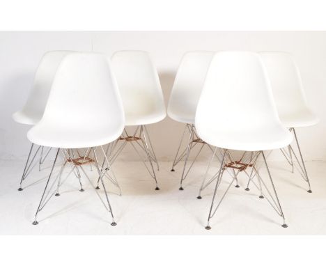 After Charles &amp; Ray Eames - A set of six retro vintage 20th century DSW chairs of white moulded plastic construction rais