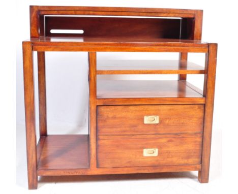 A mid century mahogany secretaire office desk. The desk having a pull out desk top with metal handles over a shelf and a twin