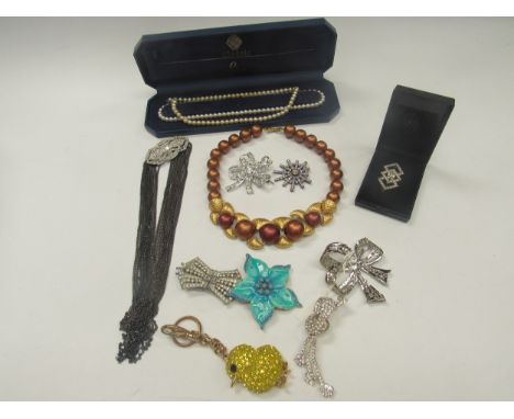 A selection of costume jewellery to include a fabulous Butler &amp; Wilson yellow diamante chic key ring, a Napier necklace c