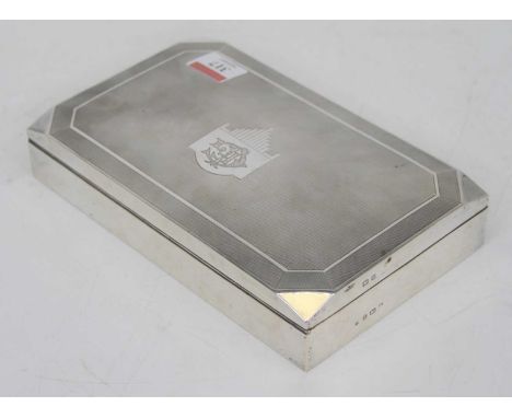 A George V silver table cigarette box, having presentation inscription and monogrammed cartouche, Birmingham 1932, w.22cm 