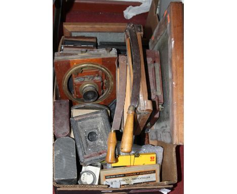 A collection of vintage magic lantern slide projector parts