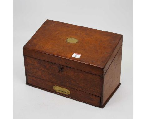 A Victorian oak stationery box, the hinged sloping front revealing a fitted interior with single drawer below, width 36cm, to