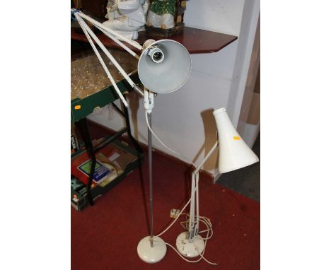 A cream painted anglepoise desk light; together with a floor-standing example (2)