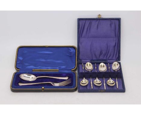A cased set of six Edward VII silver teaspoons, the handle terminating in a bullet shell, Birmingham 1902; together with a ca
