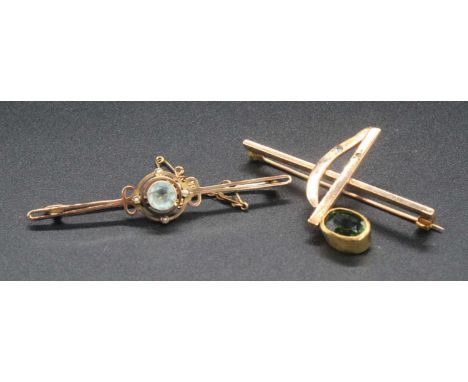 A 9ct gold, blue topaz and seed pearl set bar brooch, with safety chain and steel pin, 3g; together with a made-up yellow met