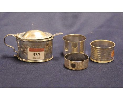 A George IV silver table mustard, 3.5ozt; together with a bright cut mustard spoon; and three napkin rings (5)