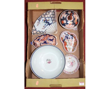 A large 19th century bowl enamel decorated in the Chinese style with various figures within an interior, the opposing reserve