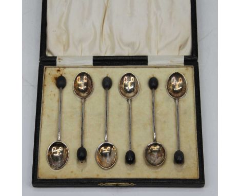A set of six Edward VII silver coffee bean spoons, each enamel decorated to the bowl, Birmingham 1902, gross weight 1.5ozt, c