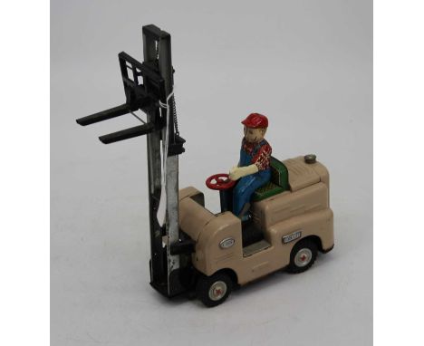 Modern Toys of Japan, tinplate and battery operated model of a Fork Lift Truck, model number s-1002, comprising tan body with