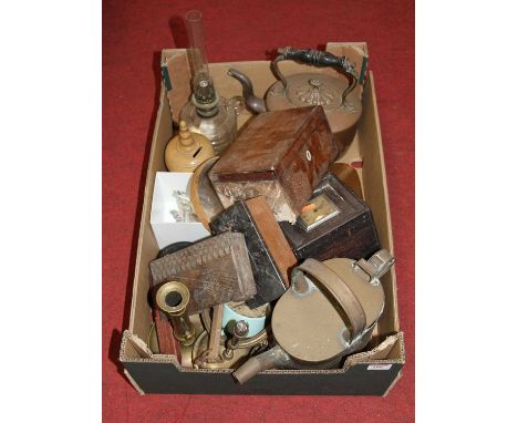 A box of miscellaneous items to include a brass watering can, a brass candlestick, a Victorian stoneware moneybox inscribed "
