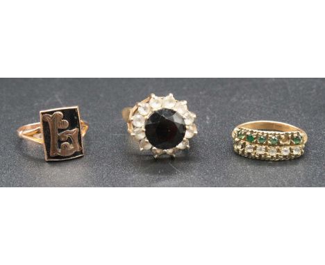 An Edwardian 9ct gold and black onyx signet ring, size K; together with a modern 9ct gold, blue and white sapphire set cluste