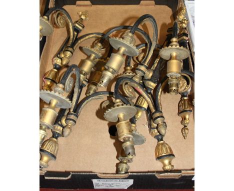 A set of five French Empire style gilt brass and black painted twin sconce wall light fittings